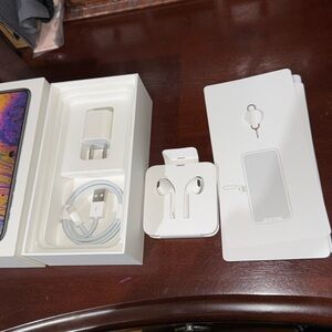 Apple headphonesnes, charger port and wire new apple accessories. Never used box